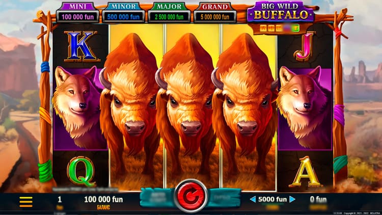 Слот Big Wild Buffalo на экране ноутбука с бонусной игрой и стаей бизонов